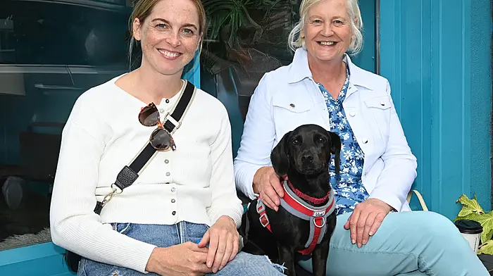 Mary Cahill with her daughter Alice and dog \