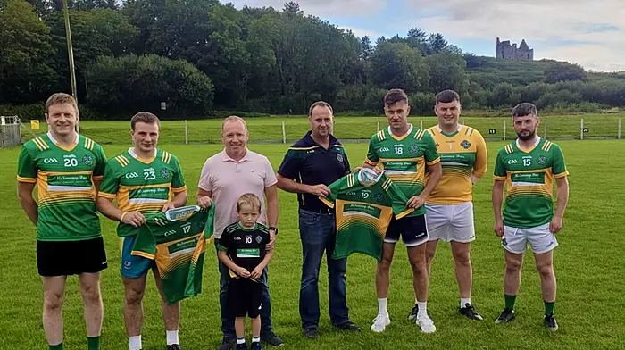 The McSweeney Bros ,Aidan, Aaron and Colm, presented a new set of championship jerseys to the Randall Og hurling and football teams represented in this photo by Ian Crowley, Sean Daly, Barry O'Driscoll, Ciaran Murray, and Eoin Murray.