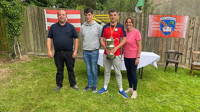 Shane Crowley who was crowned the U18 All Ireland Road Bowling Champion last weekend in Keady-Tassagh Armagh, celebrated with his proud family Donal, Eoin and Catherine Crowley.