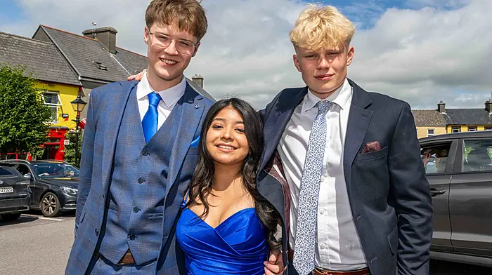 Above: Rosscarbery debutantes Will Sexton, Maribel Forde, and Will Snapes, before they headed to the Rochestown Park Hotel for the evening. Right: Ashling Keane and Adam McCarthy, also of Mount St. Michael School, get ready for the special evening ahead.(Photos: Andy Gibson)