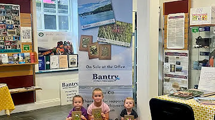 Heather Hegarty, Eve O'Sullivan and Riadh O'Sullivan presented the volunteers at Bantry Tourist Office with a bouquet of wild Montbretia and received complimentary wildflower notelets in return.