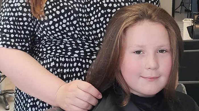 Chloe Moloney (10) from Labasheeda,  Co Clare was visiting her granny Mary McCarthy in Skibbereen for some of the summer holidays and had 16 inches of her hair cut off at Shear Influence, Skibbereen to donate to the Rapunzel Foundation, a charity that provides real-hair wigs to those who lose their hair from health conditions. Olga from Shear Influence with Chloe on the day of the haircut.