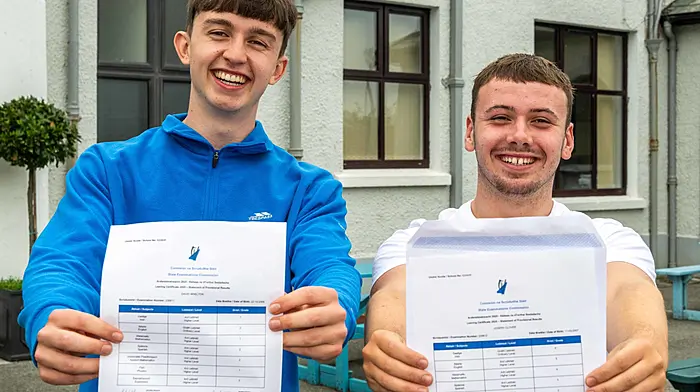 Bandon, West Cork, Ireland. 22nd Aug, 2025. Over 65,000 Leaving Cert students received their results today at schools around the country. Bandon Grammar School students met in the courtyard of the school to share their results with their classmates. Over the moon with their Leaving Cert results were David Whelton, Bandon and Joseph Clover, Innishannon. Picture: Andy Gibson.