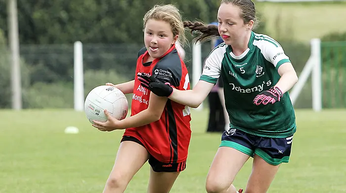 Louise Walsh of Keelnameela A in action with Dohenys' Natalie Crowley during the Munster LGFA U12 blitz. (Photo: Paddy Feen)