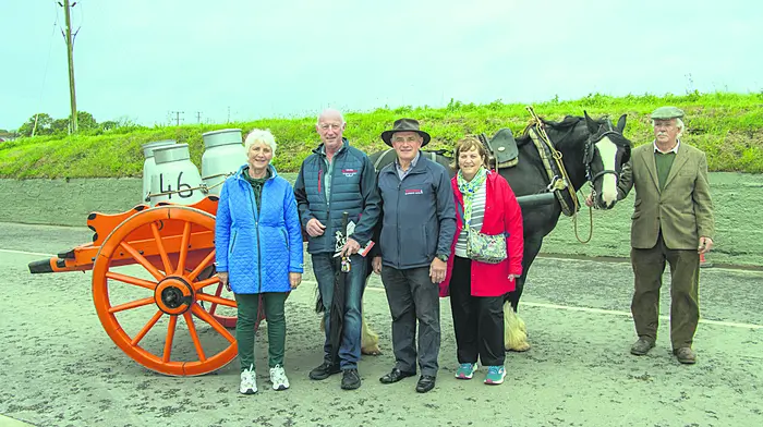 “Retired Members,” (L to R) Patricia and Seamus O’Donovan, Patrick and Kay Lawton and Dan Joe O’Sullivan with his horse “Loki.” Seamus and Patrick have retired recently from many years of service at Barryroe Co-op.