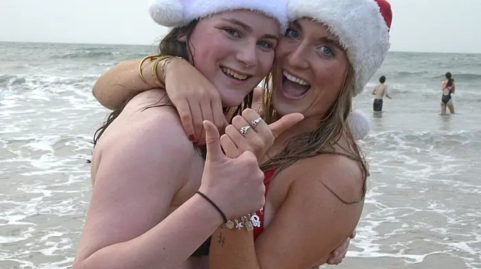 Ayla and Tara Gilli from Innishannon at the Christmas swim at Garretstown . (Photo: Denis Boyle).