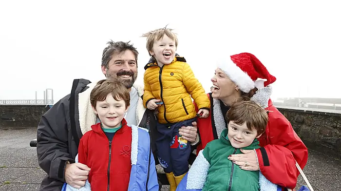 Laoise and Dan Hook with their children Rory 6, Cillian 3 and Finn 6 at Schull Christmas Day Swim. (Photo: Carlos Benlayo)