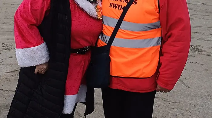 Clonakilty's mayor Eileen Sheppard and Mary White getting in the spirit for the Christmas morning swim which was held in aid of Fr John Kingston’s Mission in Mozambique.