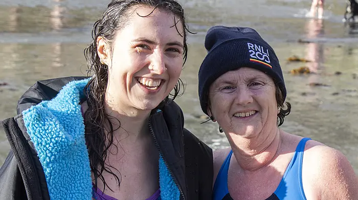 Jessica Murphy and Mary Jacinta Casey back from their dip  in Glandore Harbour at the Annual New Year’s Day swim in support of the RNLI.(Photo: Andrew Harris)