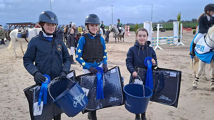 The combined West Cork team who narrowly missed out on first place, and came second, in a very competitive inaugural primary interschools equestrian competition which was held at Sceilig Equestrian Centre last weekend are (from left): Maggie McCarthy and Sadhbh Fehily of Coppeen National School and Aoife O’Regan Monaher, Ahiohill National School.  All are member of the Carbery Hunt Pony Club. 

Missing from picture is the fourth team member, Patrick Saddler from the West Carbery Pony Club.