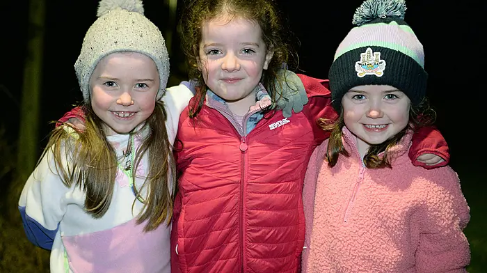 Locals (from left): Ava Murphy, Kate O'Leary and Katie Murphy were all smiles at the  Ireland Lights Up event at Páirc Uí Mhurchú, Barryroe.  (Photo: Martin Walsh)