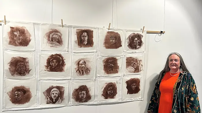 Louise McKeon pictured at the opening of her Art Exhibition 'Lives Lived ad Observed'  in Kinsale Library last Saturday .