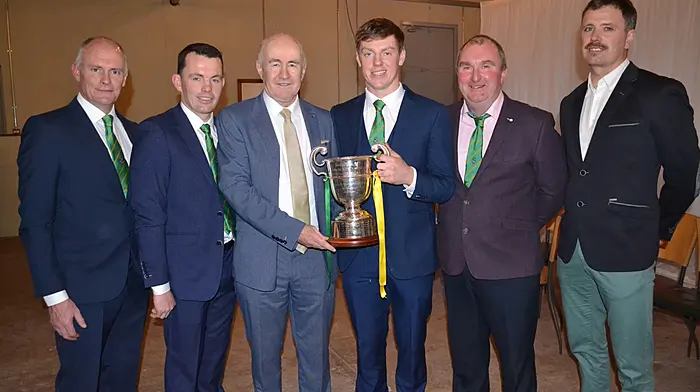 Timmy O'Mahony (selector), Donie O'Donovan (manager), John Fenton Daly (guest speaker), Diarmuid O'Donovan (captain), William Williamson (chairman) and Donncha O'Brien (strength and conditioning coach) enjoying the celebrations.