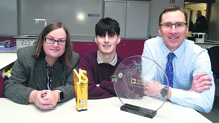 Tomás Markey at St Brogan’s College after returning from the BT Young Scientist & Technology Exhibition with Helen Cadogan (principal) and Michael Connern (science teacher). (Photo: Denis Boyle)