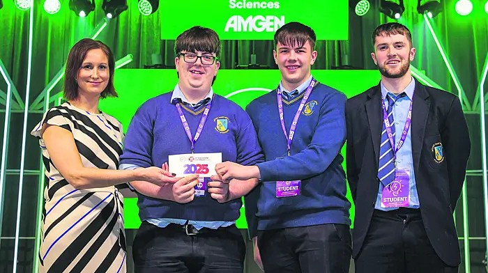 Therese Gunning, legal director at BT Ireland presenting the third place Senior Group Biological and Ecological Sciences Category Award to Adam Baker, Rory McCarthy and Vincent Daly from Mount Saint Michael for the project 'Fingerprinting Water and determining its age to help improve the quality of our rivers'.   (Photo: Fennell Photography)