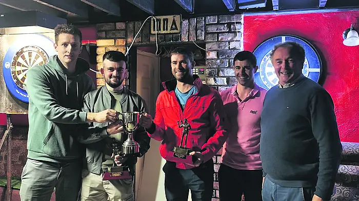 William O'Sullivan, Dan Crowley, Noel O'Sullivan, Stephen O'Sullivan and Michael Joe O'Sullivan at the recent presentation of prizes from the John Con O'Sullivan memorial darts tournament.