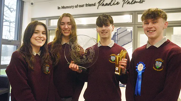 Tomás Markey at St Brogan's College with social and behavioral science group runners up Ella O'Driscoll, Caoimhe Ryan and Tadgh Og O'Donovan. (PHoto: Denis Boyle)