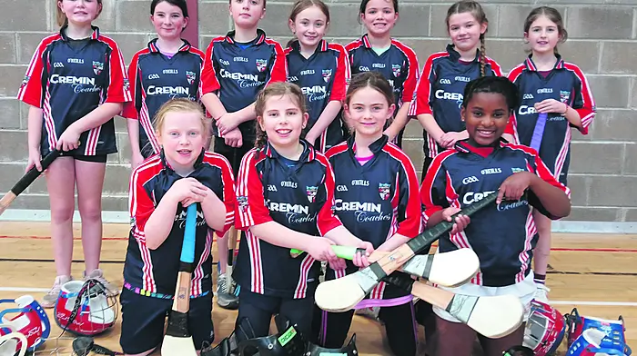 The third and fourth class camogie team from Carrigboy National School who performed extremely well at a recent blitz in Ballinacarriga are (back, from left): Maria Stout, Mary Williamson, Danielle Attridge, Farrah McCarthy, Lilly Milnes, Nicole Cronin and Lily Coughlan O'Sullivan. Front (from left): Grace Barry O'Callaghan,  Sarah Levis, Freya Russell and Nandi Dlamini.