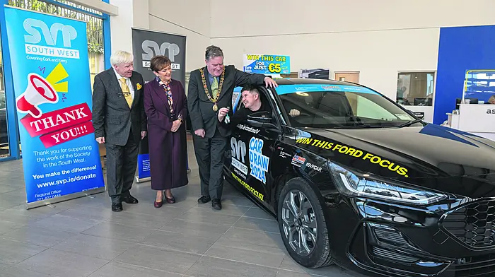 Lord mayor of Cork, Cllr Dan Boyle, along with Mary Frances Behan (south west regional president, SVP),  Francis Brennan (car draw ambassador) and Séan Kennedy junior (winner) at the handover of the prize of the Ford Focus. (Photo: Brian Lougheed)