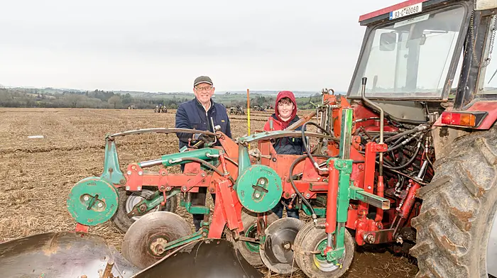 Jackie O'Driscoll (Knockbrown, Bandon) and his grandson Michael O'Driscoll (Kilbrittain) at the Bandon 80th annual ploughing match which was the fourth ploughing match of the 2024/2025 season in the Cork West region and which was held on the lands of Lisa O’Mahony, Tullyland, Bandon. Jackie took part in the intermediate conventional class with his Case International 895 tractor.  (Photo: David Patterson)