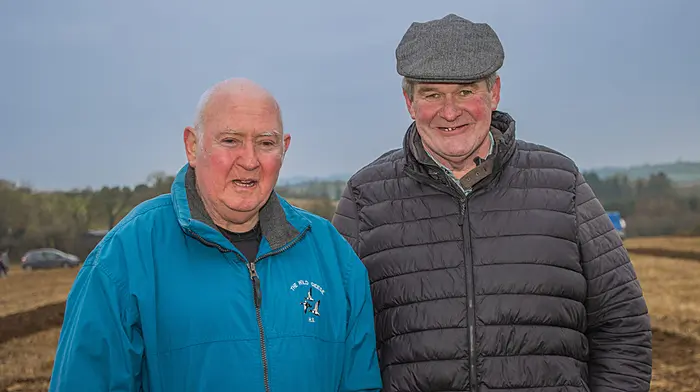 Loyal supporters Oliver Bennett from Rossmore (left) and Kieran Keohane from Timoleague at the Bandon Ploughing Match which was recently held on the lands of Lisa O’Mahony at Tullyland, Bandon.   (Photo: Gearoid Holland)