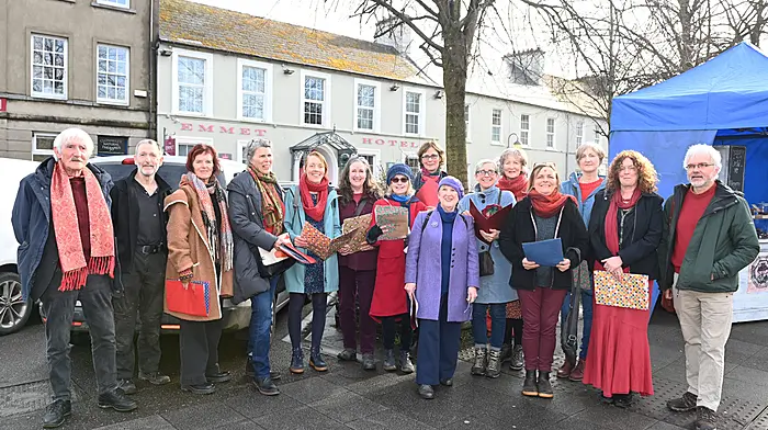 Members of the Clonakilty singing group Medazza, who meet on Wednesdays at 8pm in O'Donovan's Hotel to learn songs for Easter and spring, performing near Kennedy Park last week.  (Photo: Martin Walsh)