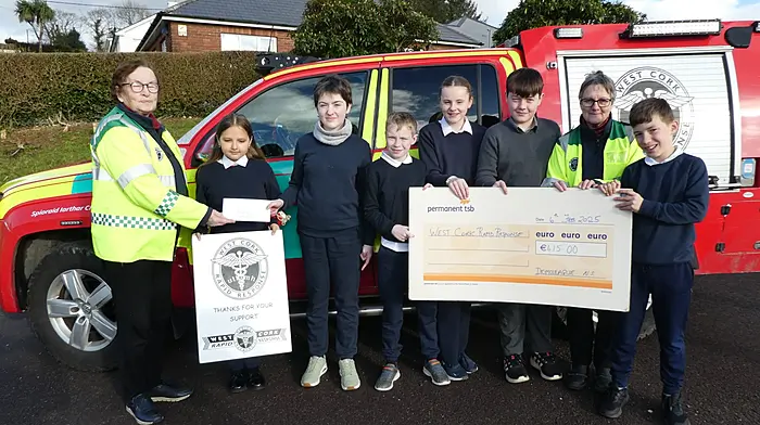 At the Drimoleague National School for the handover of a cheque for €415, the proceeds of a school Christmas jumper day fundraiser, are (from left): Betty Hennessy (West Cork Rapid Response), Sofiia Musiienko, Hannah O'Mahony, Max Buckley, Cara Keane, Keith O'Donovan, Kate Crowley (West Cork Rapid Response) and Daniel Magennis.