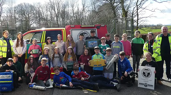 Boys and girls from Rusheen National School having fun during the visit of West Cork Rapid Response to their school recently.