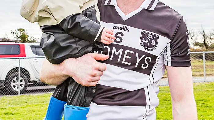 Andrew O’Sullivan with his son Adam after the Castletownbere match last weekend.  (Photo: Anne Marie Cronin)