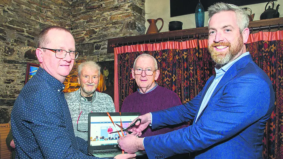 Minister cuts tape for heritage society’s updated website Image