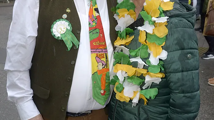 Replendescent in green, white and gold in Bandon were Aidan O'Rourke and Anne Walsh. (Photo: Denis Boyle)