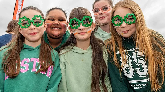 Abbey O'Sullivan (Glengarriff), Jasmine O'Mahony Sylla (Glengarriff), Sofija Buseveca (Bantry), Emma O'Brien (Glengarriff) and Caitlin Timmis (Bantry) enjoying the St Patrick’s Day parade in Bantry.  (Photo: Andy Gibson)