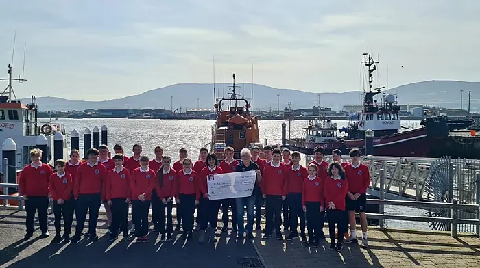 Pupils from sixth class at Scoil An Chroí Ró Naofa presenting a cheque for €1,500 to Castletownbere RNLI. The pupils raised €3,000 at their bazaar before Christmas. They also presented a cheque for €1,500 to Cancer Connect.