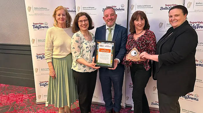 Kilbrittain Tidy Towns volunteers at the Tidy Towns south west and mid-west regional awards ceremony in Ballincollig last Monday where they accepted the silver medal won in 2024, on behalf of the community. Helen Cashman, Sinead Moloney and Anne Bradfield accepted the award from Jerry Buttimer, Minister of State at the department of rural and community development.