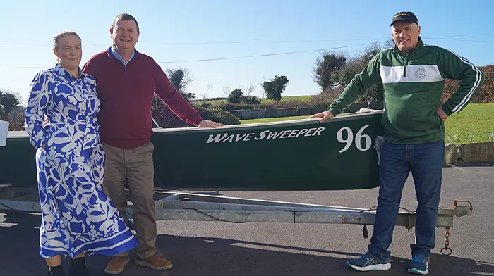 Con and Veronica Daly from Moneytree Finance presenting Tony Mannix, on behalf of Dunmanway Rowing Club, with their first coastal fixed seat boat.