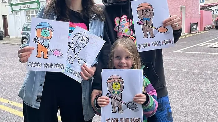 Caroline O’Donnell, Naomi O’Brien and Sadie O’Brien distributed posters created by the children of Ballydehob last week in the hope that all dog owners will clean up after their pets, and finally realise that there is no poop fairy to do it for them.