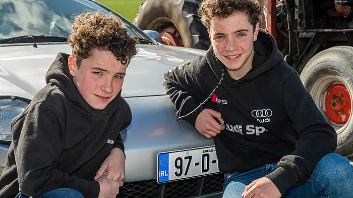 Left: Declan and Jack Corcoran from Crookstown doing one last check before the local Vintage Club run in aid of Pieta House.