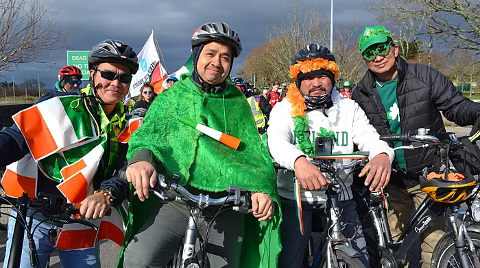Laurence Necio, Skibbereen, Arthur Lagasca, Baltimore, Algerico Maghanoy, and Arnel Valenzuela, both of Skibbereen enjoying the St. Patrick's Day Parade in the town. (Photo: Anne Minihane)