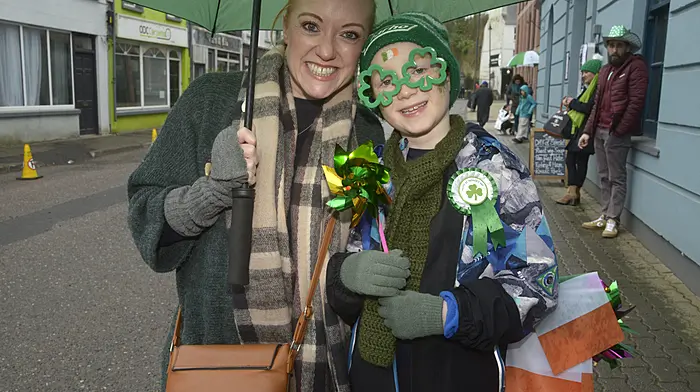 Freda and Dylan Browne enjoying the St Patrick’s Day parade in Bandon. (Photo: Denis Boyle)