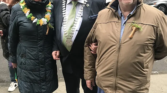 Former Skibbereen postmaster Adrian Healy with his wife Roz, and the county mayor Cllr Joe Carroll, at the New York St Patrick’s Day parade. (Photo: Adrian Healy)