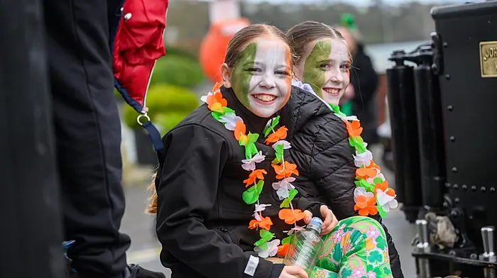 Locals Amelia Murphy and Emily Carroll enjoying the St Patrick’s Day parade in Kinsale. (Photo: John Allen)