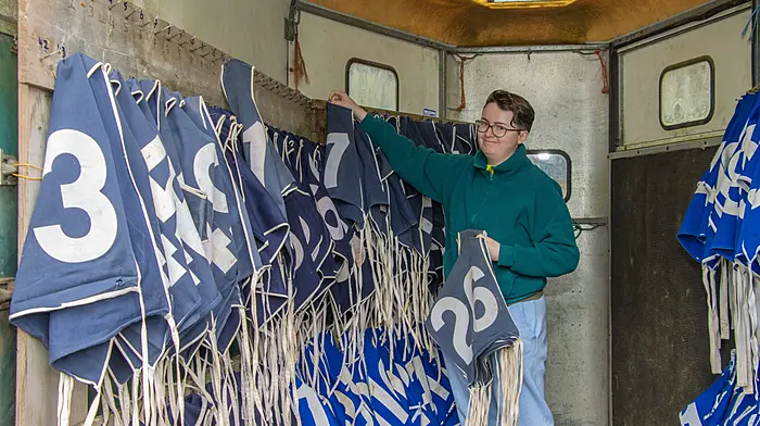 Caoimh O’Riordan on duty at the Killeady Hunter Trials, keeping track of the numbered bibs for the competitors.   (Photo: Gearoid Holland)