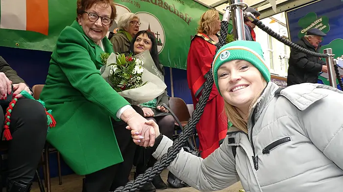 Betty Hennessy being congratulated by her daughter Caroline at the Clonakilty St Patrick's Day parade.