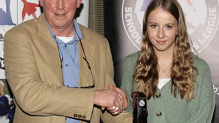 U13 Girls Player of the Year to Lilly Duggan (Dunmanway Town) with WCSSL Chairman Declan Deasy.