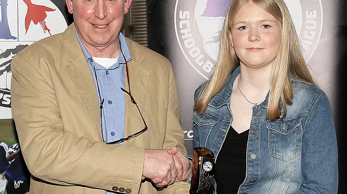 WCSSL Chairman Declan Deasy presents the U14 Girls Player of the Year to Rose O'Donovan (Drinagh Rangers).