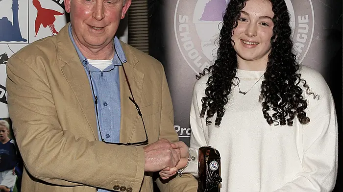 WCSSL Chairman Declan Deasy presents the U16 Girls Player of the Year to Emily Buttimer (Drinagh Rangers).