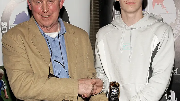 WCSSL Chairman Declan Deasy presents the West Cork Academy U14 Player of the Year 2023-24 to Luke O'Neill (Clonakilty).