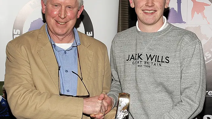 WCSSL Chairman Declan Deasy presents the West Cork Academy U15 Player of the Year 2023-24 to Sean Platt, Ardfield FC.