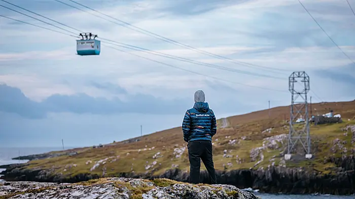 REPRO FREE***PRESS RELEASE NO REPRODUCTION FEE*** EDITORIAL USE ONLYRed Bull Dursey Island Cable Car Dive 15/10/2025Red Bull Cliff Diver Orlando Duque jumps from the Dursey Island Cable Car in West Cork. The Columbian diver completed a world-first cable car dive, plunging 24 metres in to the Atlantic Ocean below. Located on the Beara Peninsula and suspended between the mainland and Dursey Island, the cable car is the only one in Europe which crosses open sea water.Mandatory Credit ©INPHO/Red Bull Content Pool/Szymon Lazewski