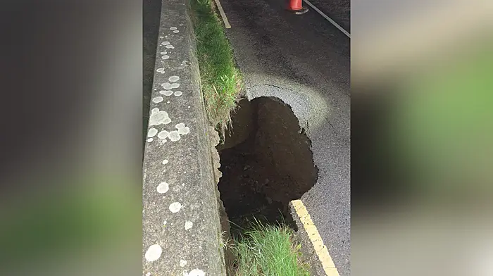 Sinkhole took ‘a chunk of the road’ Image